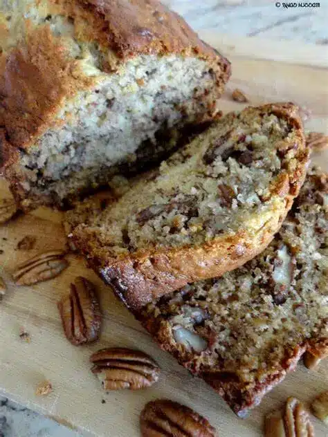 Discover the ultimate Cream Cheese Banana Bread recipe. flavorful, and perfect for any occasion. Easy to make and irresistibly delicious